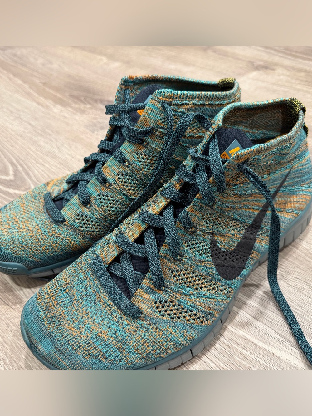 Nike men’s Flyknit Teal & Orange Training Shoes